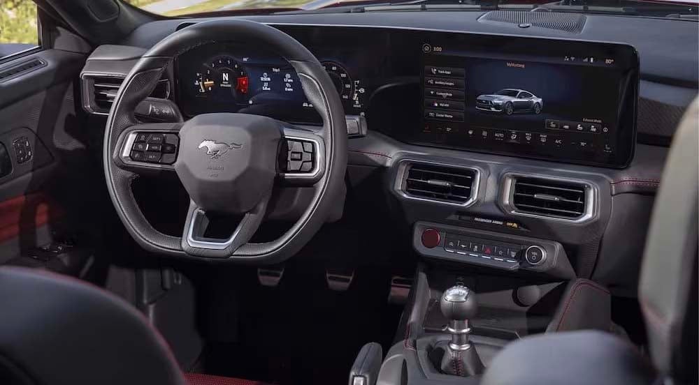 2024 Ford Mustang - Interior.jpg The gray interior and dash of a 2024 Ford Mustang is shown.