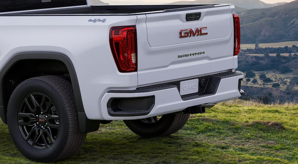 Rear view of the tailgate of a white 2025 GMC Sierra 1500 Pro.