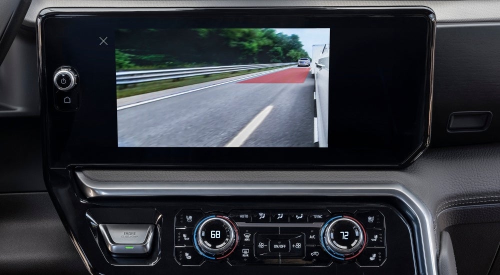 The infotainment screen is shown in a 2024 GMC Sierra 3500 HD Denali.
