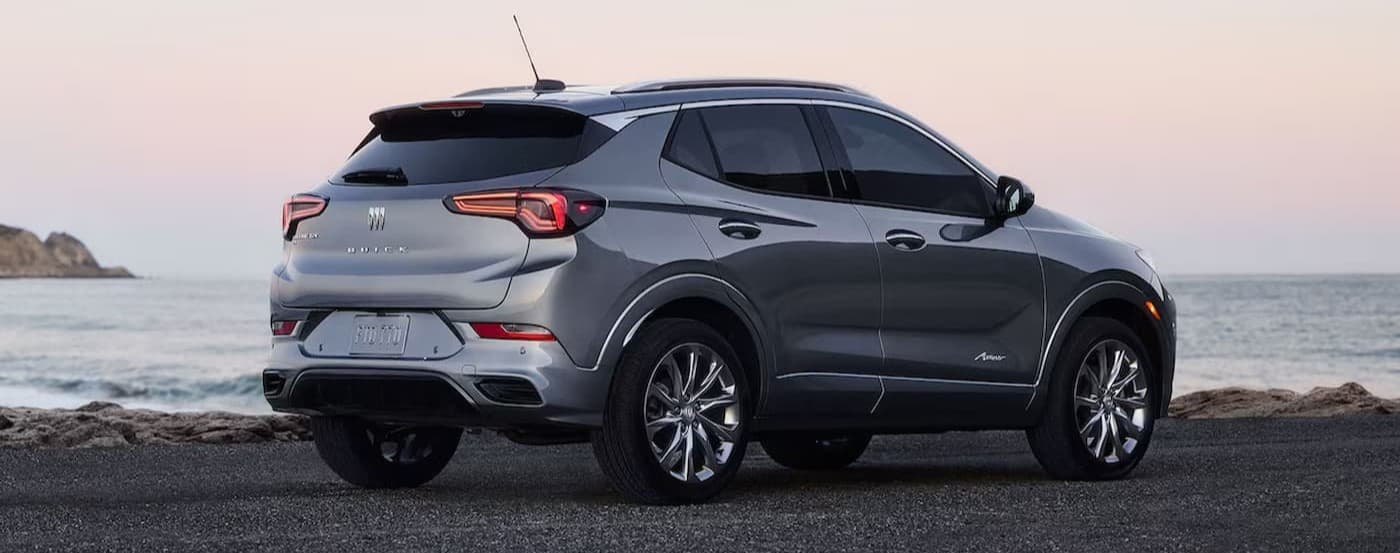 A silver 2026 Buick Encore parked near water.