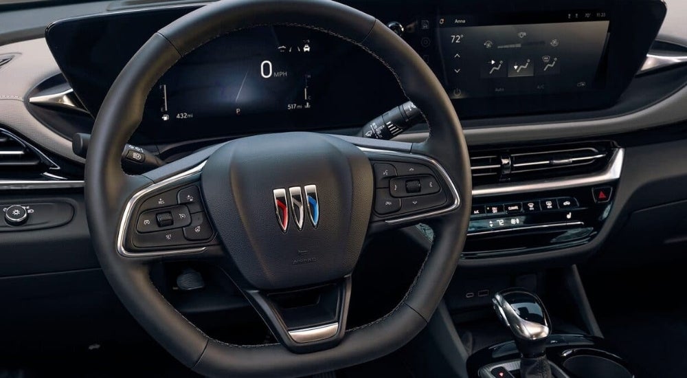 A close-up shows the black interior is shown in a2024 Buick Envista.