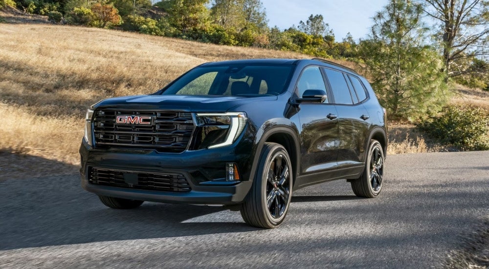 A black 2025 GMC Acadia for sale in Mankato parked