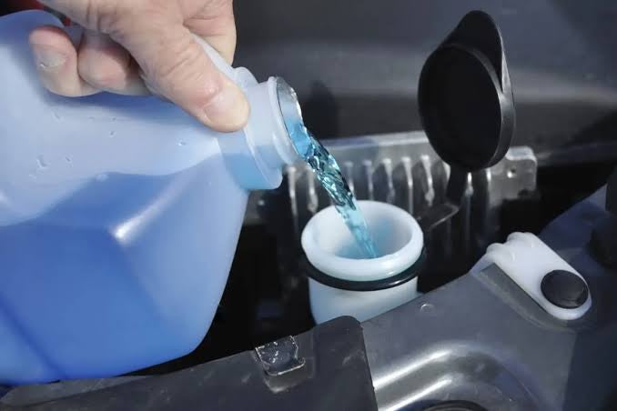 Checking vehicle fluids before summer travel on the Gulf Coast