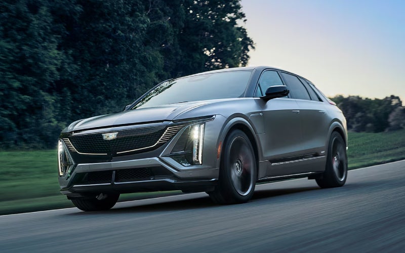 Which luxury EV--2026 Cadillac LYRIQ or BMW iX--offers the best hands-free driving confidence around Jacksonville, IL?