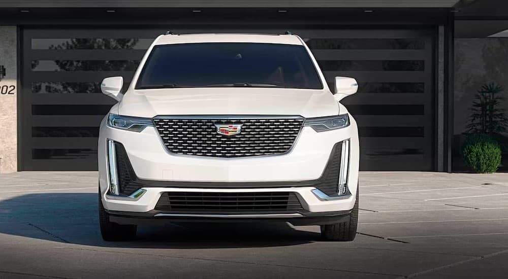 A parked white 2023 Cadillac XT6.