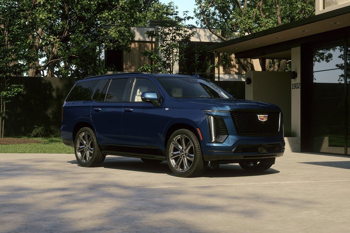 Cadillac Escalade full-size luxury SUV parked in a driveway