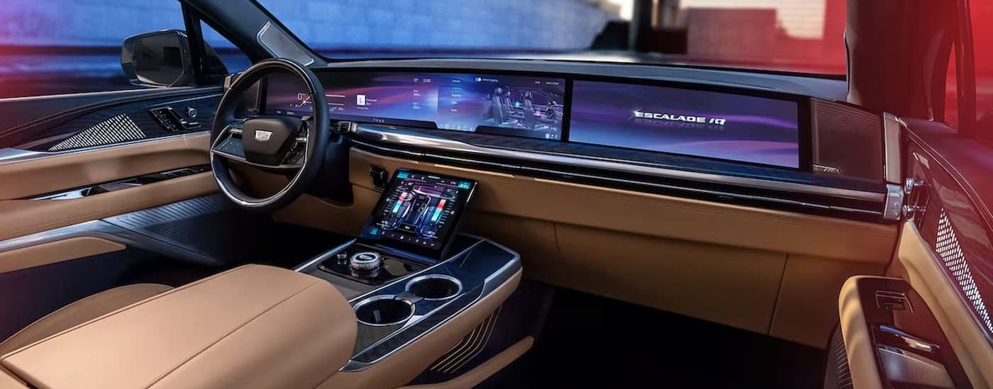 Black and tan interior and dash in a 2025 Cadillac IQ.