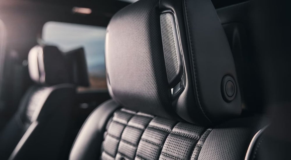 A clack up shows the black leather headrest in a 2023 Cadillac Escalade.