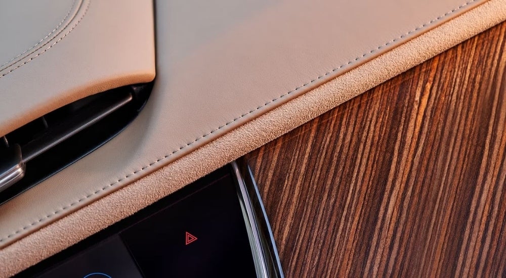 A close-up show leather and woodgrain details in a 2023 Cadillac XT6.