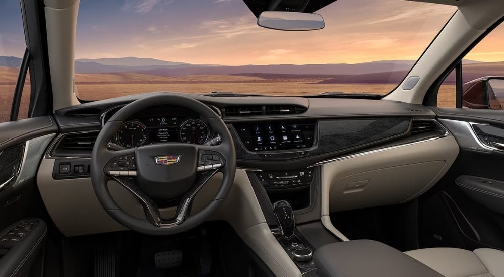 The black dash and grey interior is shown in a 2024 Cadillac XT6.