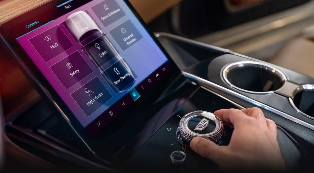 Options are shown on the infotainment screen in a 2024 Cadillac Escalade IQ.