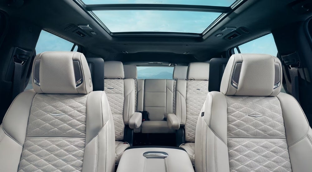 White leather seating is shown in a 2025 Cadillac Escalade.