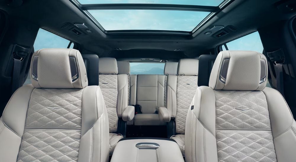 Interior view of a 2026 Cadillac Escalade with light gray seats.