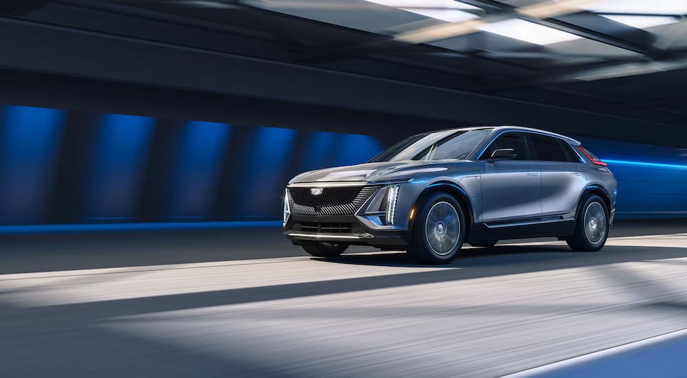 A silver 2026 Cadillac LYRIQ driving for sale near Saint Peter