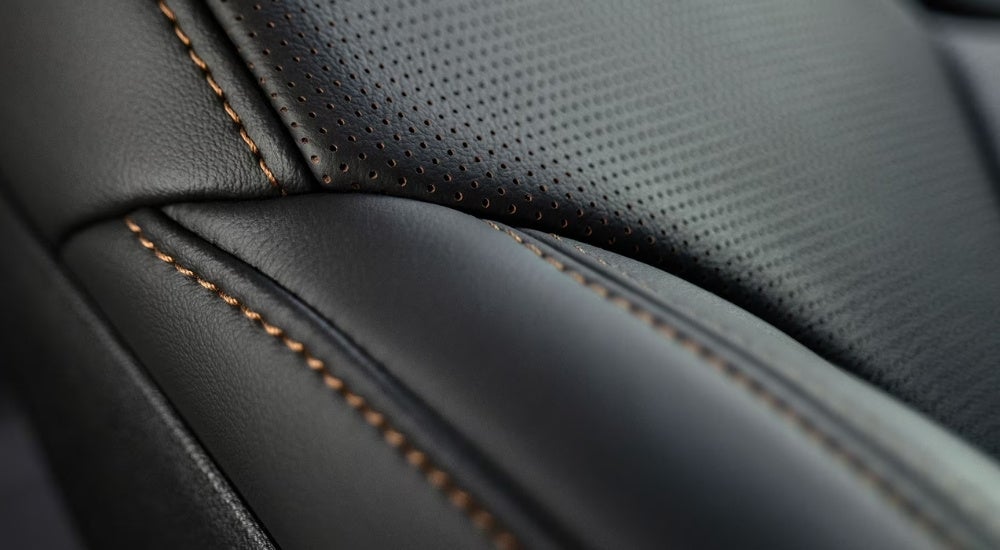 A close up shows the black leather seat details in a 2024 Cadillac CT5.