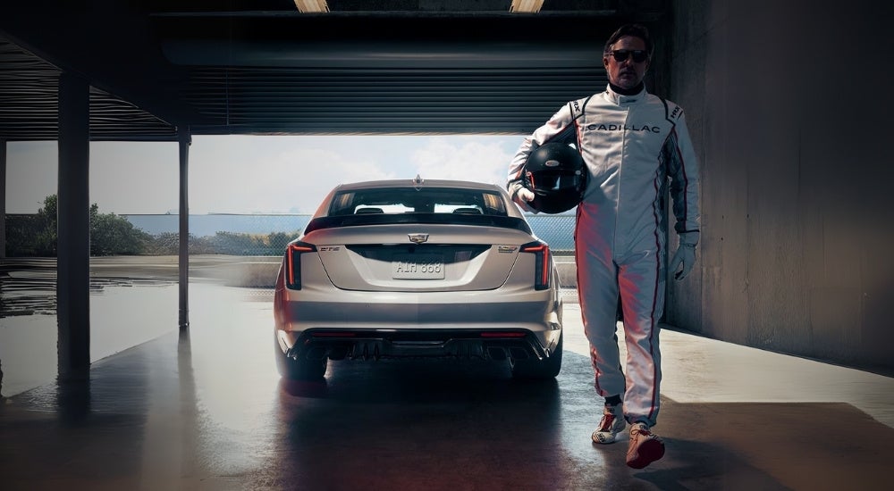 A white 2024 Cadillac CT5-V Blackwing is shown in a garage.