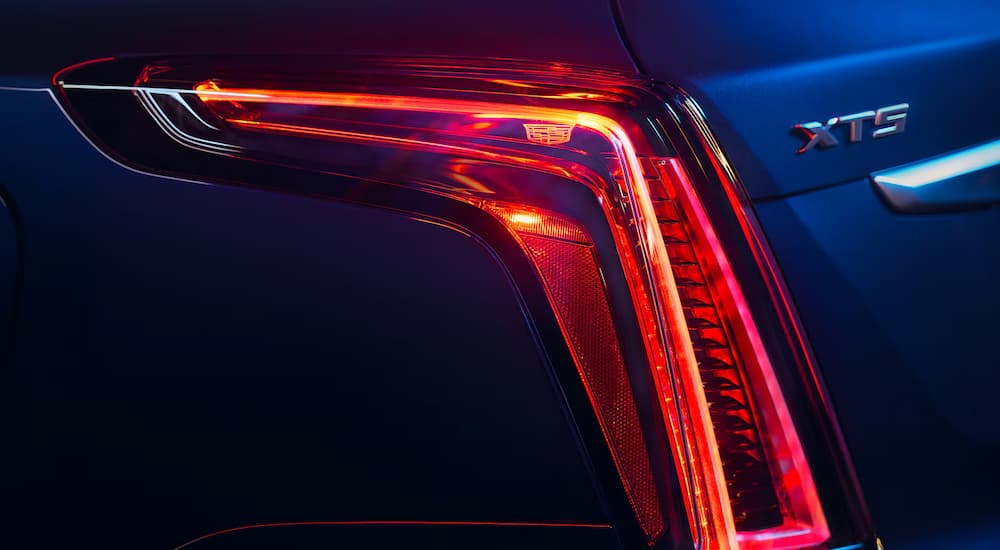 Taillights on a blue 2026 Cadillac XT5 for sale near Owatonna