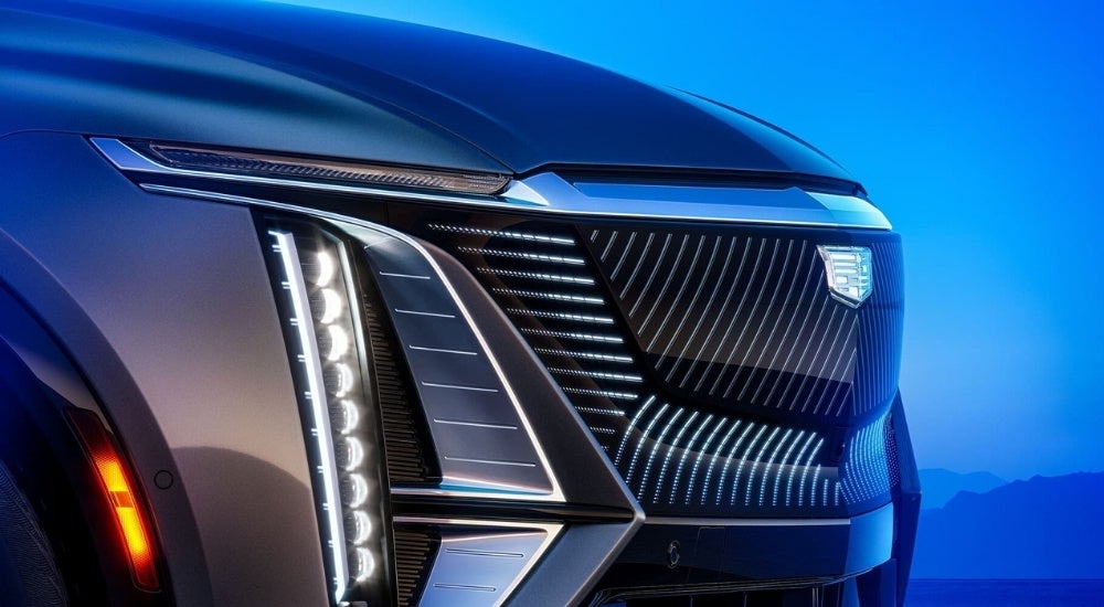 A close up shows the grille on a grey 2024 Cadillac LYRIQ.