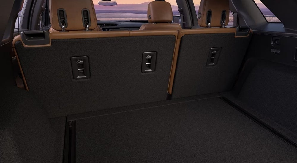 Rear black and brown interior details are shown in a 2024 Cadillac XT5.