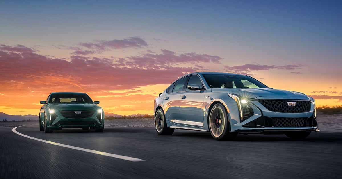 two 2025 Cadillac CT5 driving on the road
