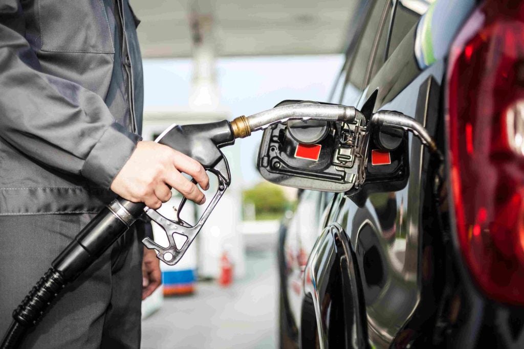 Cadillac at the gas pump
