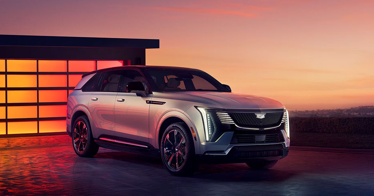 2025 Cadillac Escalade IQ luxury SUV at dusk available at Huston Cadillac serving Central Florida families
