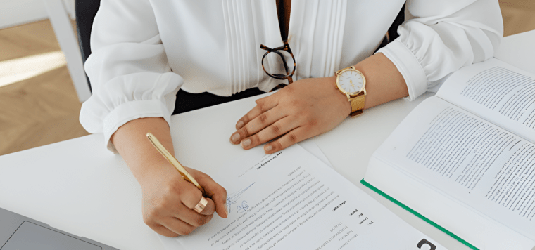 Cadillac finance and lease paperwork at Huston Cadillac serving first-time luxury buyers near Lake Wales in Central Florida