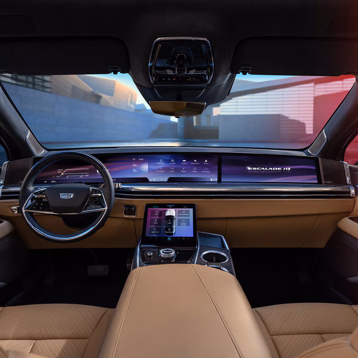 Interior view of the 2026 Cadillac Escalade IQ, showcasing the futuristic dashboard with a wide display and sleek design.