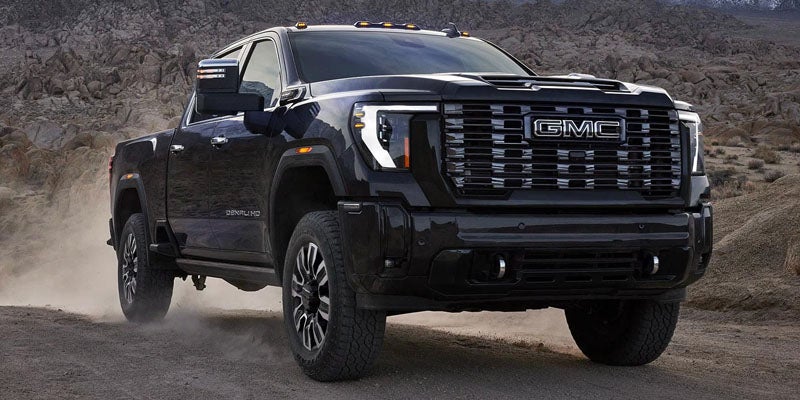 Black 2026 GMC Sierra 2500 driving near Gilbert, AZ