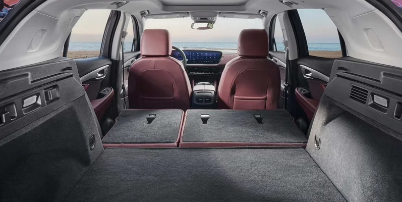 A photo showing how much space is in the back of a 2026 Buick Envision with the back seats folded down.
