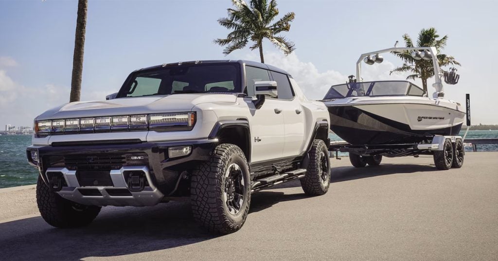 GMC Hummer towing a boat
