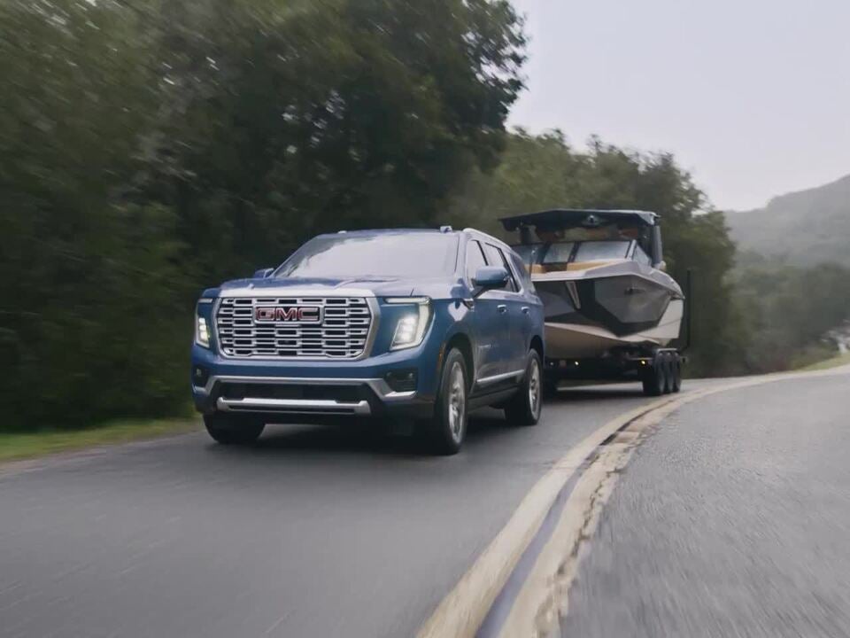GMC Yukon towing a boat