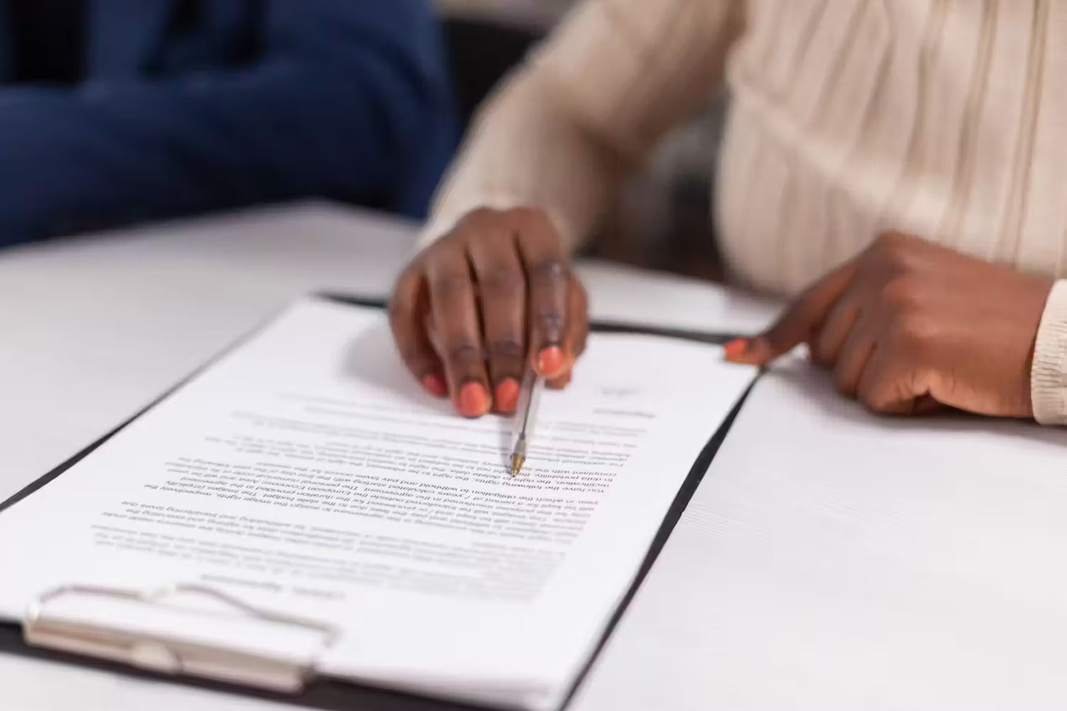 Customer signing paperwork