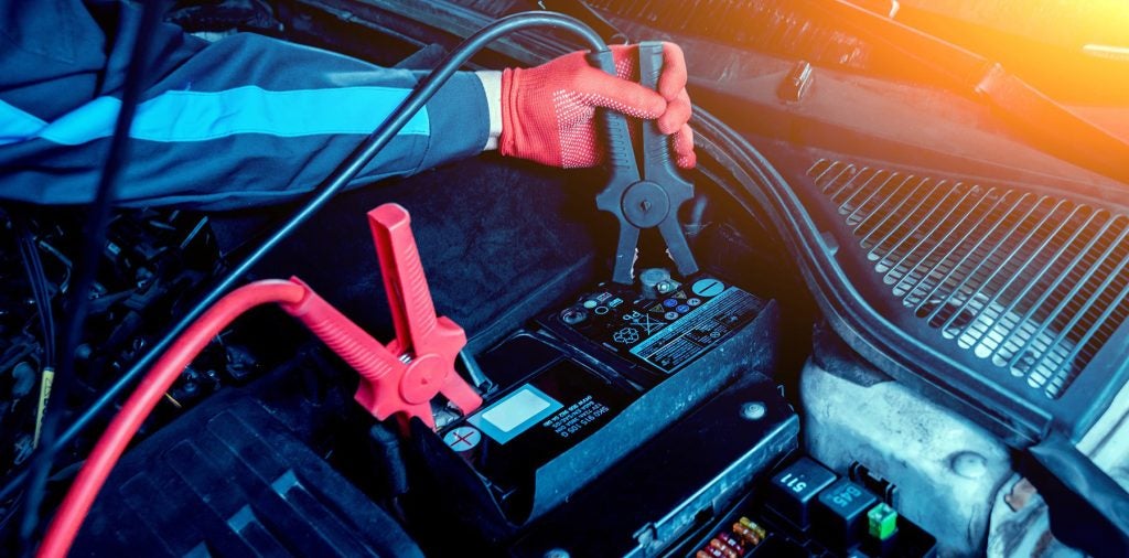 Car Battery Being Jumped Off