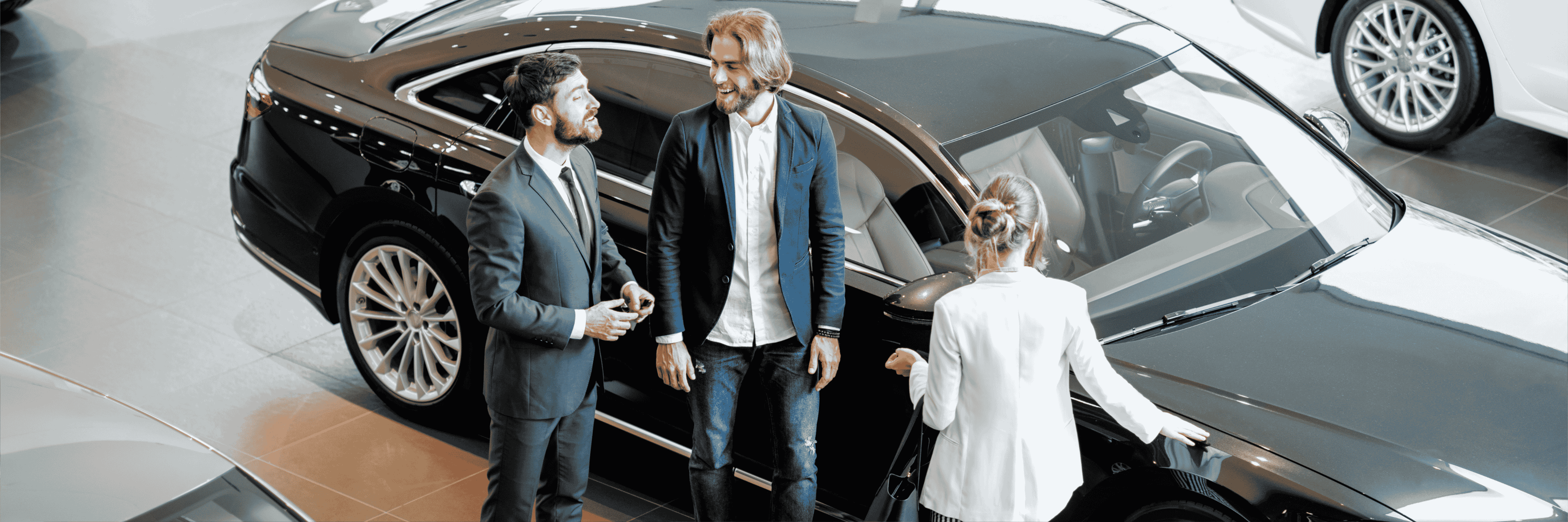 Victory GMC finance team assisting a customer