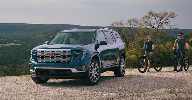 Person signing a lease for a GMC vehicle in California 