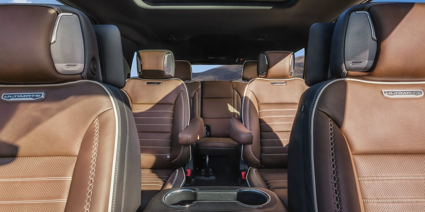 2027 GMC Yukon Denali Ultimate cabin with brown leather seats in all three rows, at Ross Downing GMC in Gonzales, LA