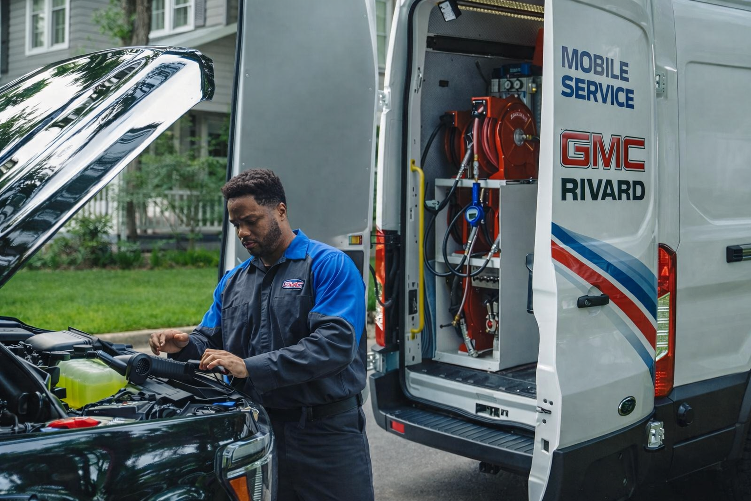 Rivard mobile service technician working from a fully-equipped GMC service van in Tampa FL