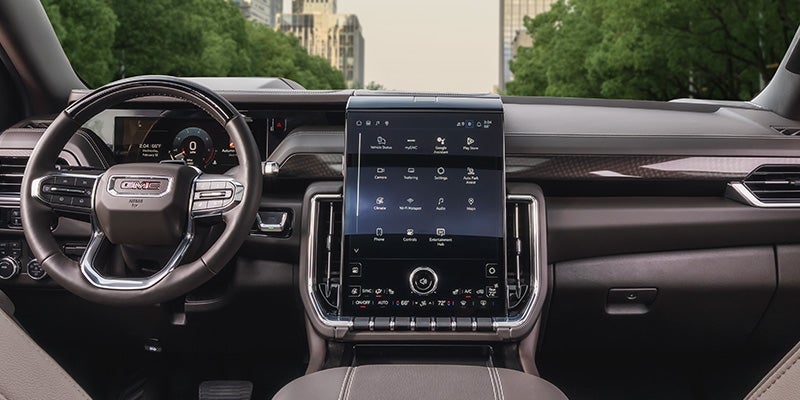 Interior cabin of the 2026 GMC Yukon Denali showing available Rear-Seat Media System screens