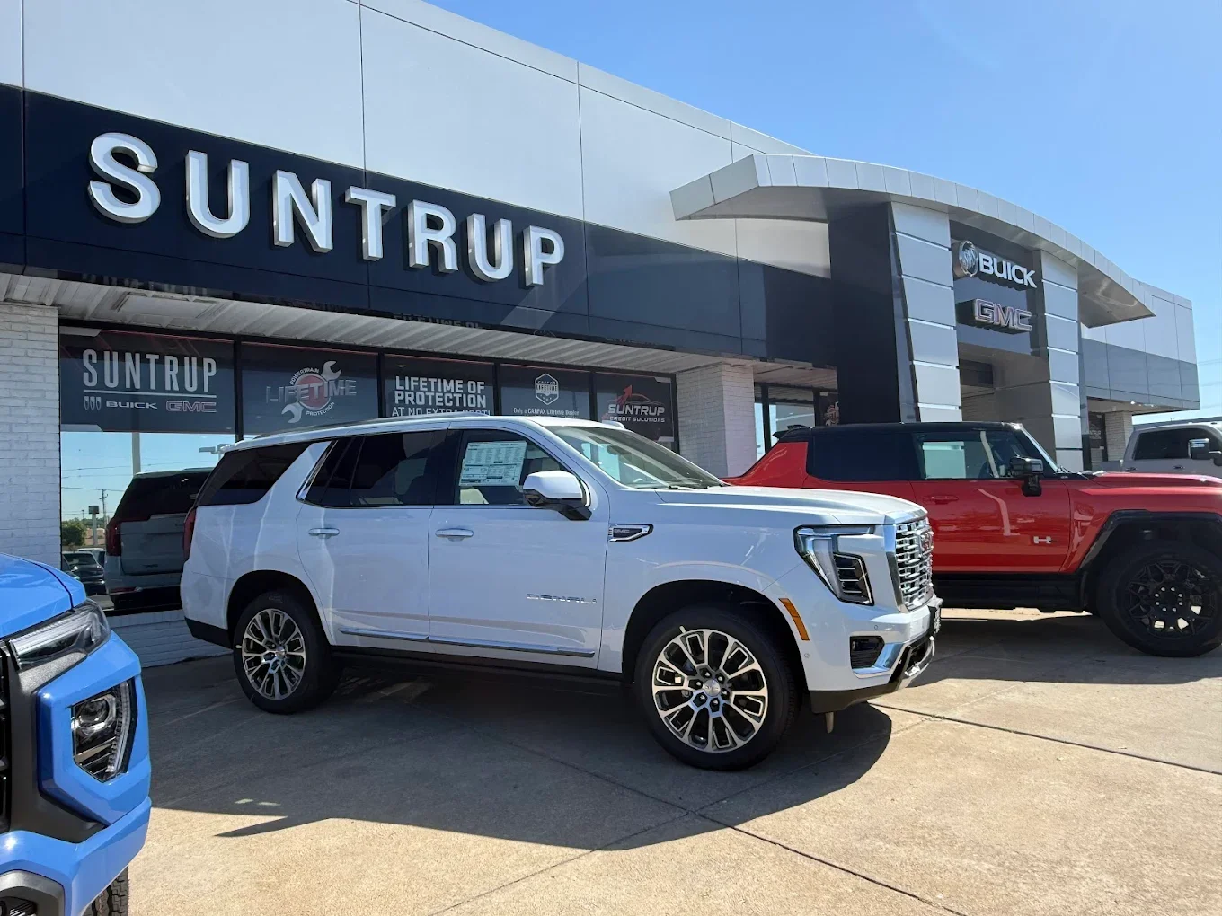 Pre-owned and certified vehicles on the lot at Suntrup Buick GMC in St. Peters, Missouri