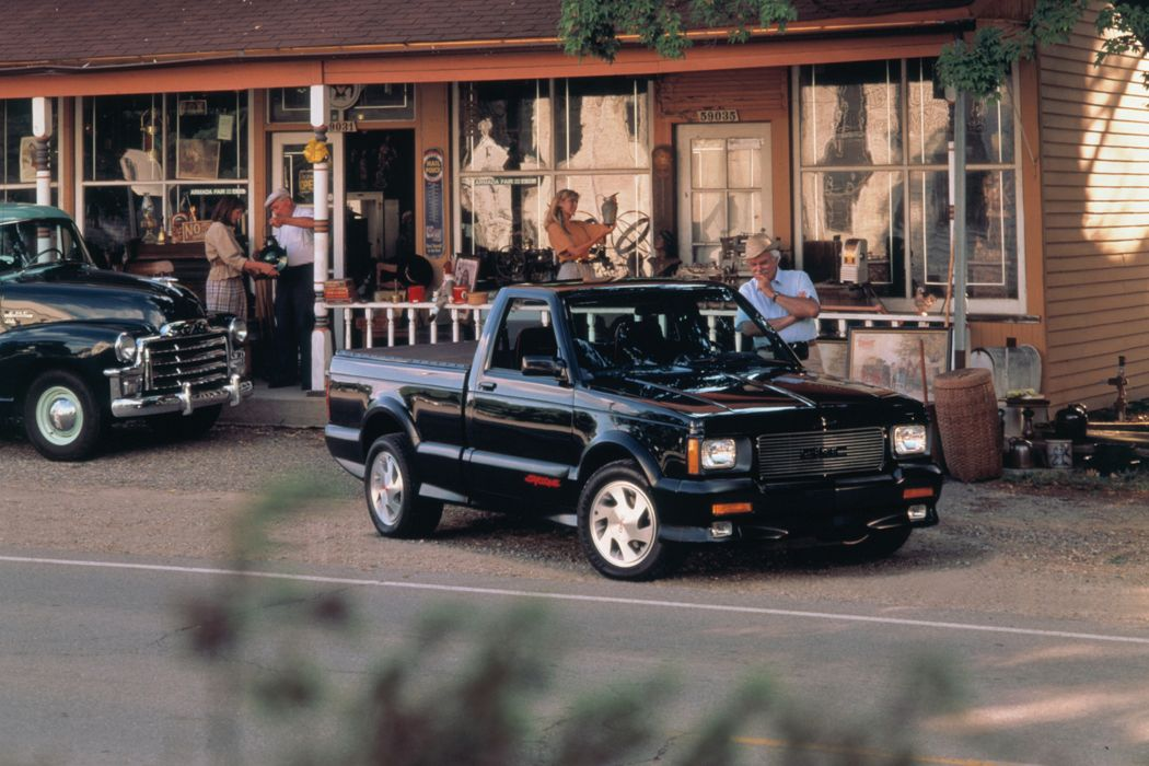 1991 GMC Syclone in front of a country store