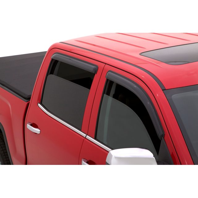 Red pickup truck with tinted windows and black vent visors. The truck bed is covered with a black cover, conveying a practical and sleek look.