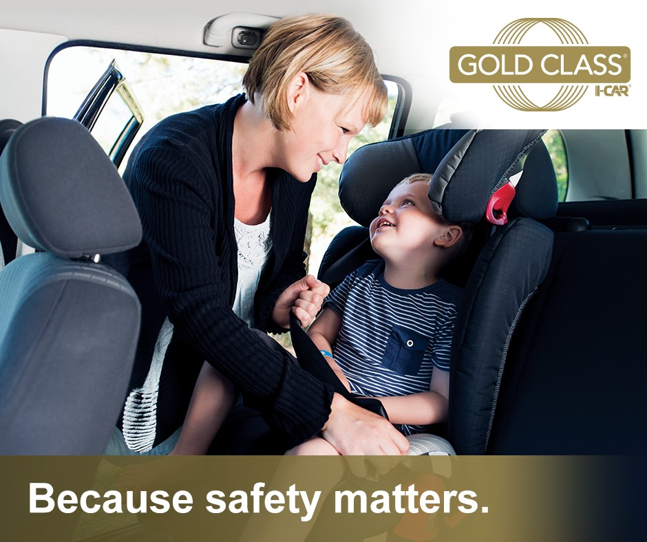 A woman is smiling and fastening a young child into a car seat. The child is smiling back. Text reads "Because safety matters." Logo: "Gold Class I-CAR."