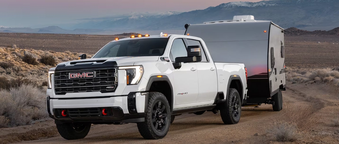 GMC MultiPro Tailgate open on the 2026 Sierra 2500 HD AT4 at a job site