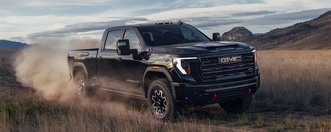 2026 GMC Sierra 2500 HD AT4 on an off-road trail