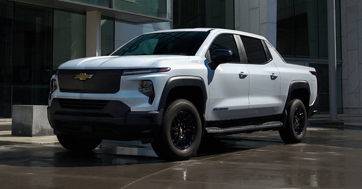 2024 Chevy Silverado EV parked outside a building