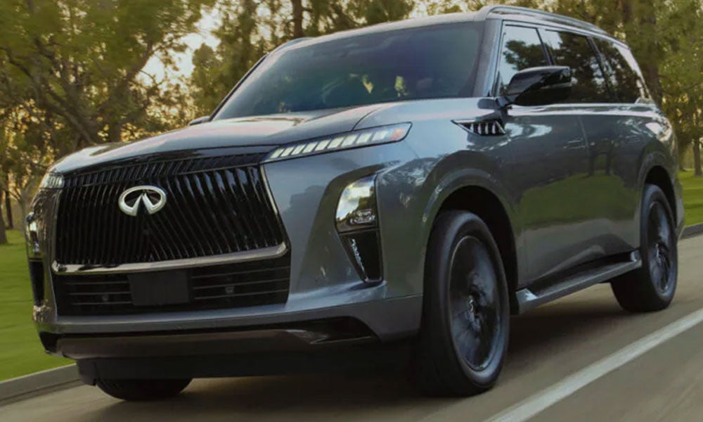A sleek grey Infiniti QX80 SUV on the road