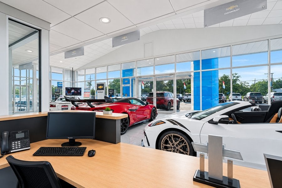 Showroom at Ross Downing Chevrolet in Hammond, LA with new Corvettes on display