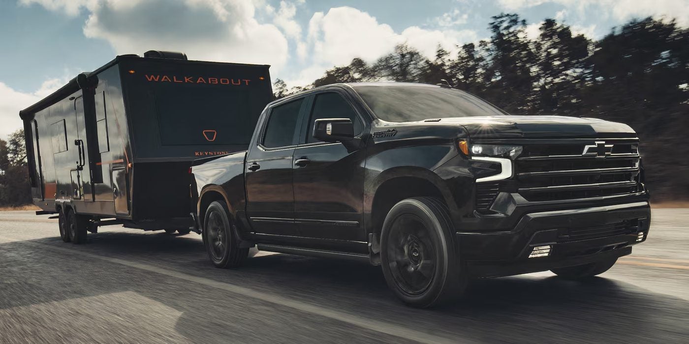 New 2026 Chevy Silverado 1500 towing a trailer