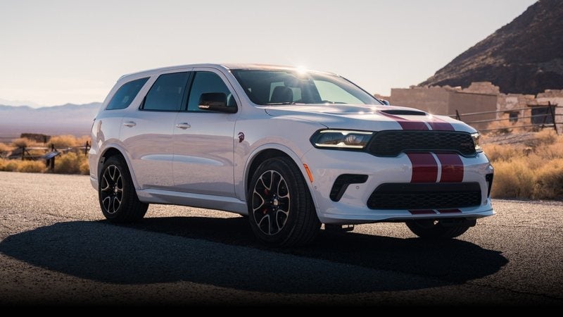 White 2027 Dodge Durango SRT Hellcat Jailbreak with red stripes in the desert; trade in your vehicle at Ross Downing CDJR in Hammond, LA